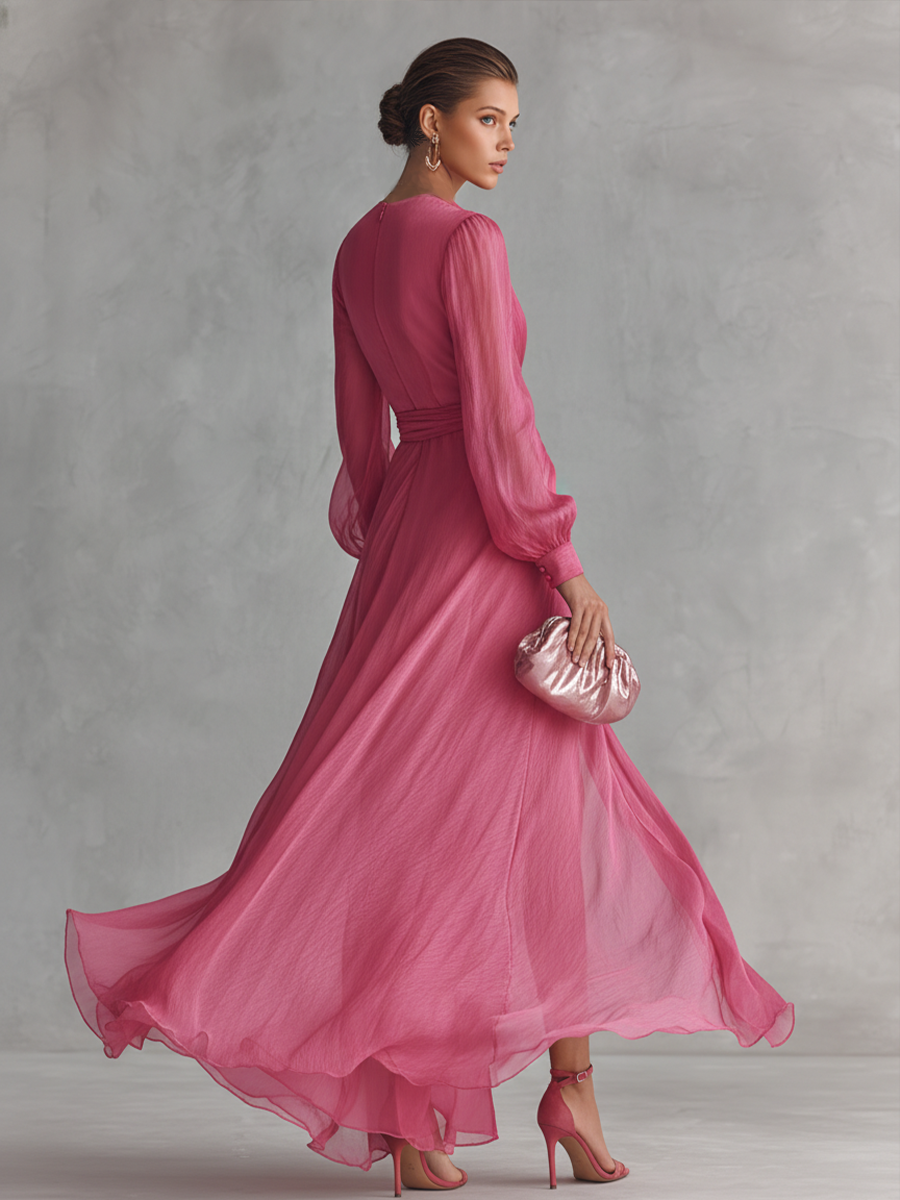 Elegant long women's dress in pearl pink chiffon with V-neck and waist belt